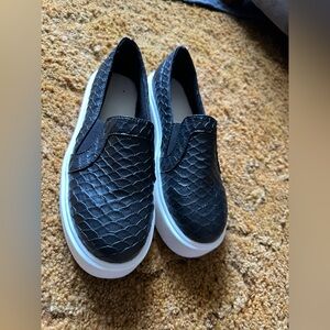 Black Textured Slip-On Sneakers with White Soles